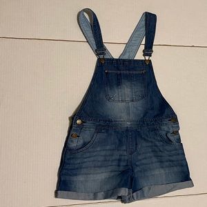 An extra large, kids, blue overall.